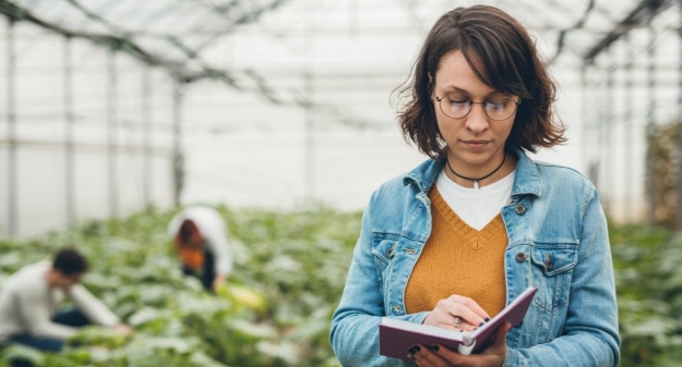 woman in greenhouse