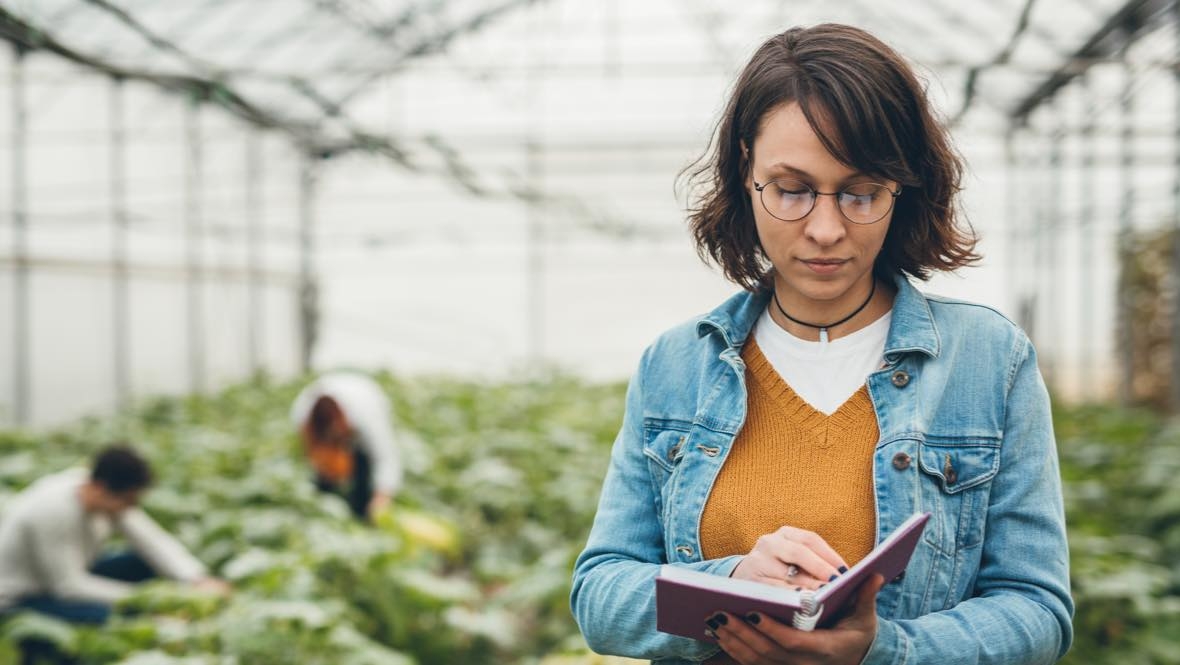 woman in greenhouse